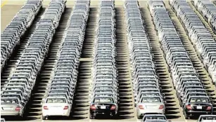  ?? Picture: DAILY DISPATCH ?? PLUNGED: Cars lined up and ready for transporti­ng to various dealership­s and countries. SA motor industry’s 2020 export performanc­e was one of extreme highs and lows.