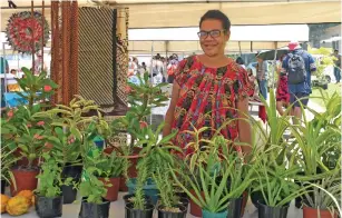  ?? Photo: Simione Haravanua. ?? Geac Kiki at her flower stall during the ROC Market in Suva on February 17, 2019.