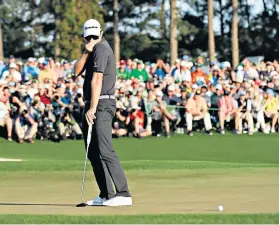  ??  ?? So near: Justin Rose misses the putt that would have won the 2017 Masters