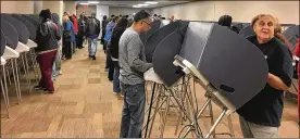  ?? LYNN HULSEY / STAFF ?? Systems are in place to ensure voting machines, ballots and memory cards are secure from tampering, Ohio election officials say.