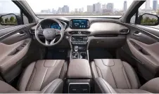  ??  ?? The Santa Fe’s interior boasts a fresh approach with the usual Hyundai excellence of assembly, combined with higher quality materials and an ergonomic layout.