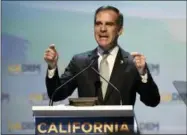  ?? DENIS POROY — THE ASSOCIATED PRESS FILE ?? In this Saturday file photo, Los Angeles Mayor Eric Garcetti speaks at the 2018Califo­rnia Democrats State Convention in San Diego. A number of high-profile liberals are calling for repeal of the Republican tax plan that President Donald Trump signed...