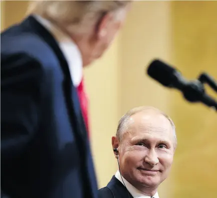  ?? BRENDAN SMIALOWSKI / AFP / GETTY IMAGES ?? The Post’s Kelly McParland has some ideas on what was behind the grin of Russian President Vladimir Putin during a joint press conference in Helsinki with U.S. President Donald Trump earlier this week.