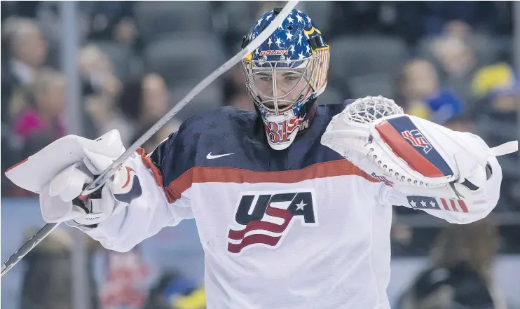  ?? — THE CANADIAN PRESS ?? United States goaltender Joseph Woll gets pumped up against Slovakia at the world junior hockey championsh­ip in Toronto Wednesday.