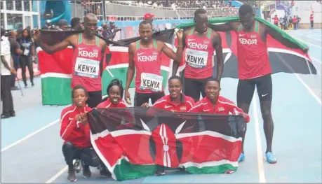  ??  ?? Kenyan athletes celebratin­g topping the 21st African Senior Athletics Championsh­ip in Asaba...on Sunday