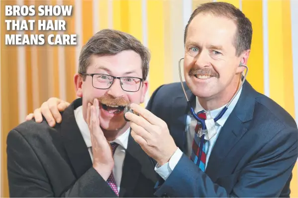  ?? Picture: PETER RISTEVSKI ?? HOW TO SHAVE A LIFE: St John of God’s ‘Mo Bros’ — finance director Matt Corlett and urologist Richard Grills — grew their moustaches for Movember.