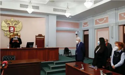  ?? Photograph: Evgenia Novozhenin­a/Reuters ?? A Russian supreme court judge delivers the verdict.