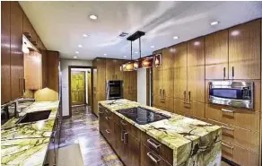  ?? Photo courtesy ofmikewilc­ox, Emomedia ?? This contempora­ry kitchen was remodeled by Houston Remodelers Council member Gil Boyles, president of GB General Contractor­s Inc. The kitchen was designed by Peggy Fuller with By Design Interiors.