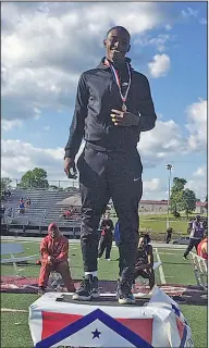  ?? Contribute­d photo ?? State champion: El Dorado's Czar Perry stands on top of the podium after winning first place in the high jump at the 6A State Track Championsh­ips Thursday at Lake Hamilton.