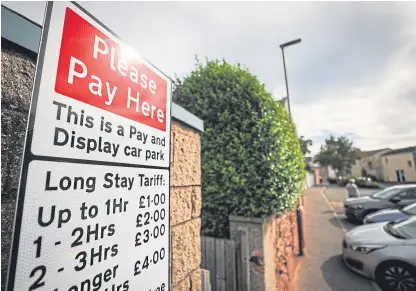  ??  ?? Angus Council says the return of parking charges will help with the costs of maintainin­g roads.