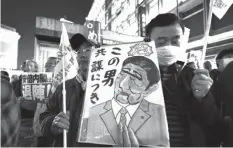  ?? AGENCE FRANCE PRESSE ?? Critics have mounted protests over Prime Minister Shinzo Abe's policies, including his support for a controvers­ial imperial edict.
