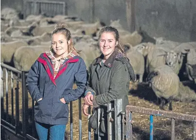  ??  ?? SUCCESS: Aimee and Kirsty Budge of Bigton Farm, Shetland, were honoured for their hard work