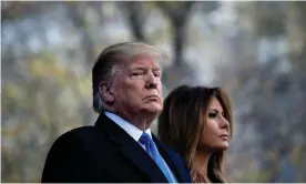  ??  ?? Donald Trump with First Lady Melania. His presidency has revealed that America has become a hopelessly divided nation. Photograph: Brendan Smialowski/Getty