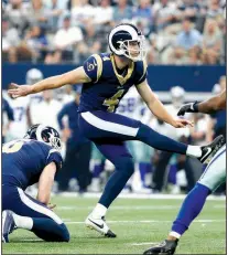  ?? AP/MICHAEL AINSWORTH ?? Los Angeles Rams placekicke­r Greg Zuerlein kicked a career-high seven field goals, one short of the NFL record, in Sunday’s game. Zuerlein kicked a 44-yarder on the final play of the first half, and his longest was from 49 yards.