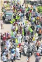  ?? —AFP ?? Farmers take out a protest march against the weekend lockdown in Amritsar, Punjab.