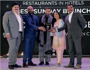  ?? ?? Team Novotel Hyderabad Convention Centre & Hyderabad Internatio­nal Convention Centre—Kailash Gundupalli, culinary director, Amarjeet Singh, marketing director and Anand Prakash Ravi, F&B director receive the award for the Best Sunday Brunch.