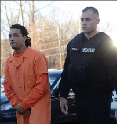  ?? TANIA BARRICKLO — DAILY FREEMAN ?? Murder suspect Maurice L. Stansberry is led into Ulster Town Court on Tuesday.