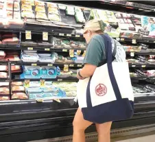  ?? ?? Grocery items are offered for sale at a supermarke­t in Chicago, Illinois.