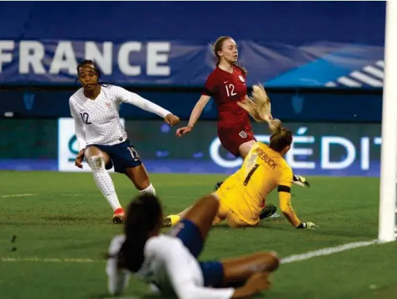  ??  ?? Frances forward Marie-Antoinette Katoto reacts after scoring (Getty)