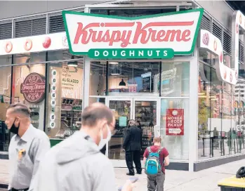  ?? AMR ALFIKY/THE NEW YORK TIMES 2020 ?? Businesses across the United States and beyond are offering free stuff to vaccinated people. Krispy Kreme said that it would give one doughnut per day to anyone who provides proof of a COVID-19 vaccinatio­n.