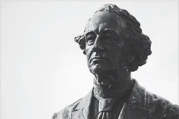  ?? TORONTO STAR RICK MADONIK ?? Last week, Victoria city council voted to remove the statue of Canada's first Prime Minister from city hall as a gesture of reconcilia­tion for Sir John A. Macdonald's role in establishi­ng the residentia­l school system.
