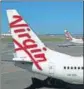  ??  ?? Cash-strapped Virgin Australia grounded its operations last month amid Covid-19.BLOOMBERG