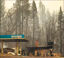  ?? Kent Nishimura Los Angeles Times ?? CALIFORNIA can learn from the forest management in Baja California, Mexico, George Skelton writes. Above, a gas station destroyed in this month’s Creek fire.