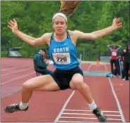  ?? PETE BANNAN — DIGITAL FIRST MEDIA ?? Natalie Kwortnik of North Penn won the long jump with a distance of 19-04.00 at the Disrtrict 1-AAA championsh­ip.