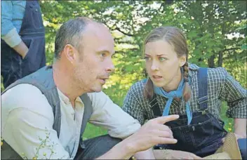  ?? - FILE ?? Jamie Konchak, left, of Two Planks and a Passion Theatre, was nominated for a Merritt Award for her role as Joan in Dustbowl Joan. She is pictured with Marty Burt.