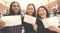  ?? ZULFADHLI ZAKI/ THESUN ?? From left: Jaishiree, Sophie and Olivia posing with their results.