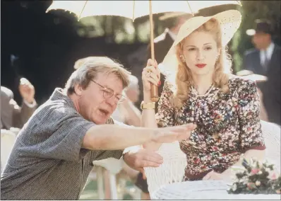  ?? PICTURE: GETTY IMAGES ?? ‘EXTRAORDIN­ARY TALENT’: Madonna with director Alan Parker at work on the set of the movie Evita 1997.