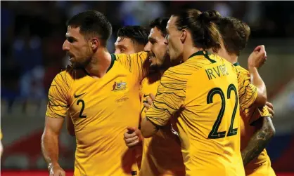  ?? Photograph: Tom Dulat/Getty Images ?? Australia celebrate Mathew Leckie’s opening goal.