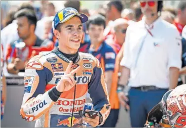  ??  ?? AJUSTADO. Márquez, Dovizioso y Lorenzo estuvieron separados tan solo por 125 milésimas en Austria.