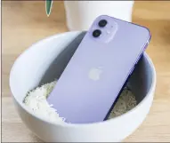  ?? ?? Do not put your iPhone in a bowl of rice.