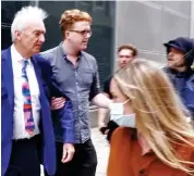  ??  ?? Abuse: Jon Snow confronted outside ITN