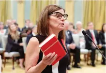  ??  ?? Filomena Tassi is sworn in as Minister of Seniors at Rideau Hall in Ottawa on Wednesday.
