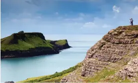  ?? Photograph: David Chapman/Alamy ?? Natural highs … Rhossili Bay and Worms Head offer some of the most spectacula­r views on the Gower peninsula.