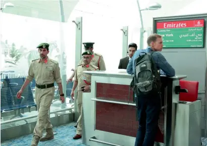  ?? Dubai Media Office ?? Dubai Police Chief Maj-Gen Abdullah Khalifa Al Merri visits Terminal 3 of the Dubai Internatio­nal Airport on Wednesday to check the inspection procedures after the ban on electronic devices on Emirates flights to the US was lifted. —