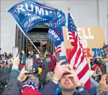  ?? PHOTOS / AP ?? Protesters at the US Capitol challenged the 2020 presidenti­al election, and now some Republican­s are seeking to influence future votes.