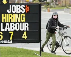  ?? NATHAN DENETTE THE CANADIAN PRESS FILE PHOTO ?? A consensus of economists surveyed by Bloomberg had expected Canada’s economy to add only 2,500 jobs in February.