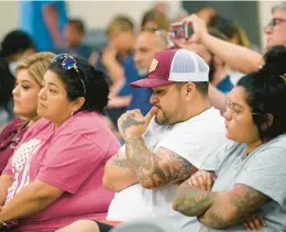  ?? ERIC GAY/AP ?? Family members of mass shooting victims at an elementary school in Uvalde, Texas, listen as an investigat­ive report by state lawmakers is released on Sunday.