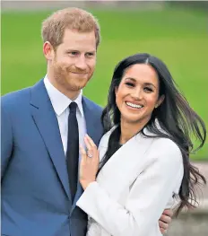  ??  ?? The royal couple: might need a bit of brainstorm­ing for Netflix ideas