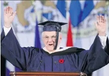  ?? JIM WELLS ?? Murray McCann, Calgary business leader and philanthro­pist, gestures during his speech to graduates as he receives an honorary Bachelor of Nursing degree from Mount Royal University on Friday.