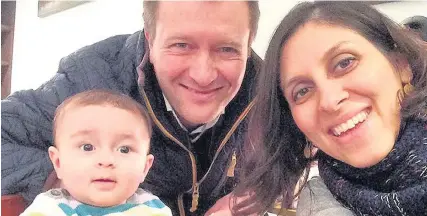  ??  ?? > Nazanin Zaghari-Ratcliffe with her husband Richard Ratcliffe and their daughter Gabriella