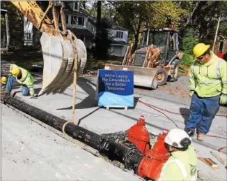  ?? PHOTO COURTESY OF AQUA PENNSYLVAN­IA ?? Scenes like this one on Greene Road in Tredyffrin depicted in the fall of 2014 are commonplac­e in eastern Chester County this summer as water main replacemen­t work is continuing.