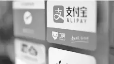  ??  ?? Alipay said it processed almost three times as many in-store overseas transactio­ns compared with the previous correspond­ing period in 2017. — Reuters photo