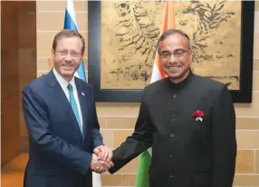  ?? (Amos Ben Gershom/GPO) ?? President Isaac Herzog with Indian Ambassador Sanjeev Singla.