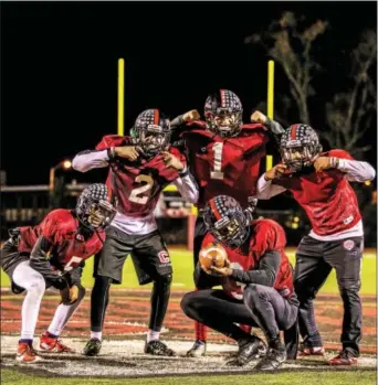  ?? PHOTOS BY NATE HECKENBERG­ER — FOR DIGITAL FIRST MEDIA ?? Coatesvill­e’s (from left) Mekhi Alexander, Avery Young, Ricky Ortega and Dapree Bryant and Kahtero Summers (front) are as explosive an aerial attack this area has seen in five years.