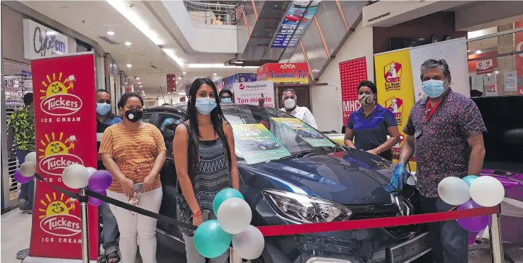  ?? Photo: Laiseana Nasila ?? Representa­tives from MH and MaxVal-u supermarke­t and Goodman Fielder during the ‘Buy and Win Promotion’ draw at MHCC complex in Suva on July 10, 2021.