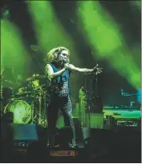  ?? NATHAN BURTON/Taos News ?? Lead singer Jim James reaches out towards the audience during the performanc­e Friday (Aug. 19) at Kit Carson Park.